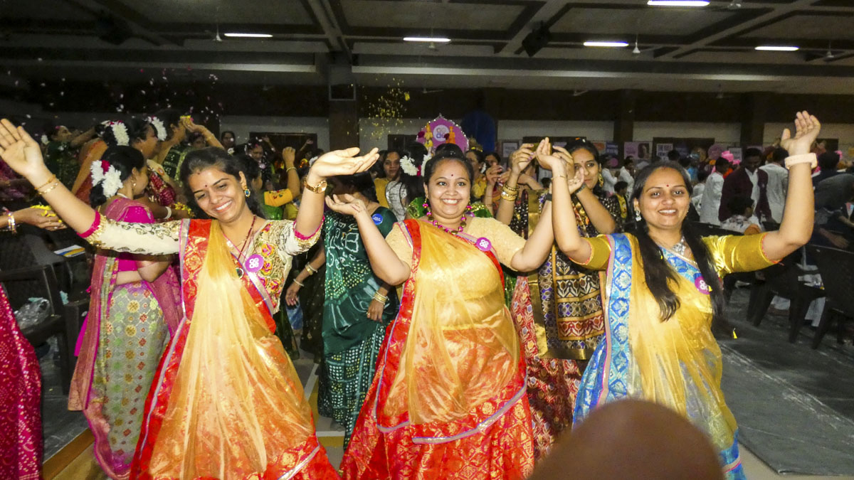 Balika karyakars perform folk dances as part of the procession