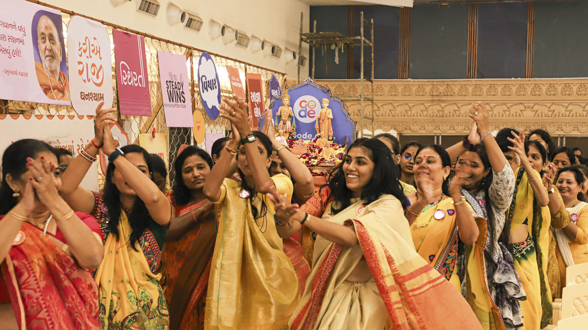 Balika karyakars perform folk dances as part of the procession