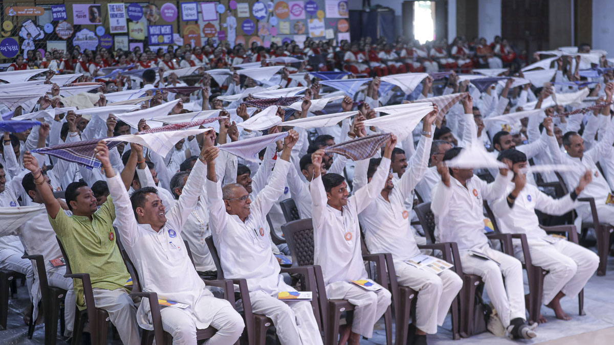 Karyakars take part in an activity
