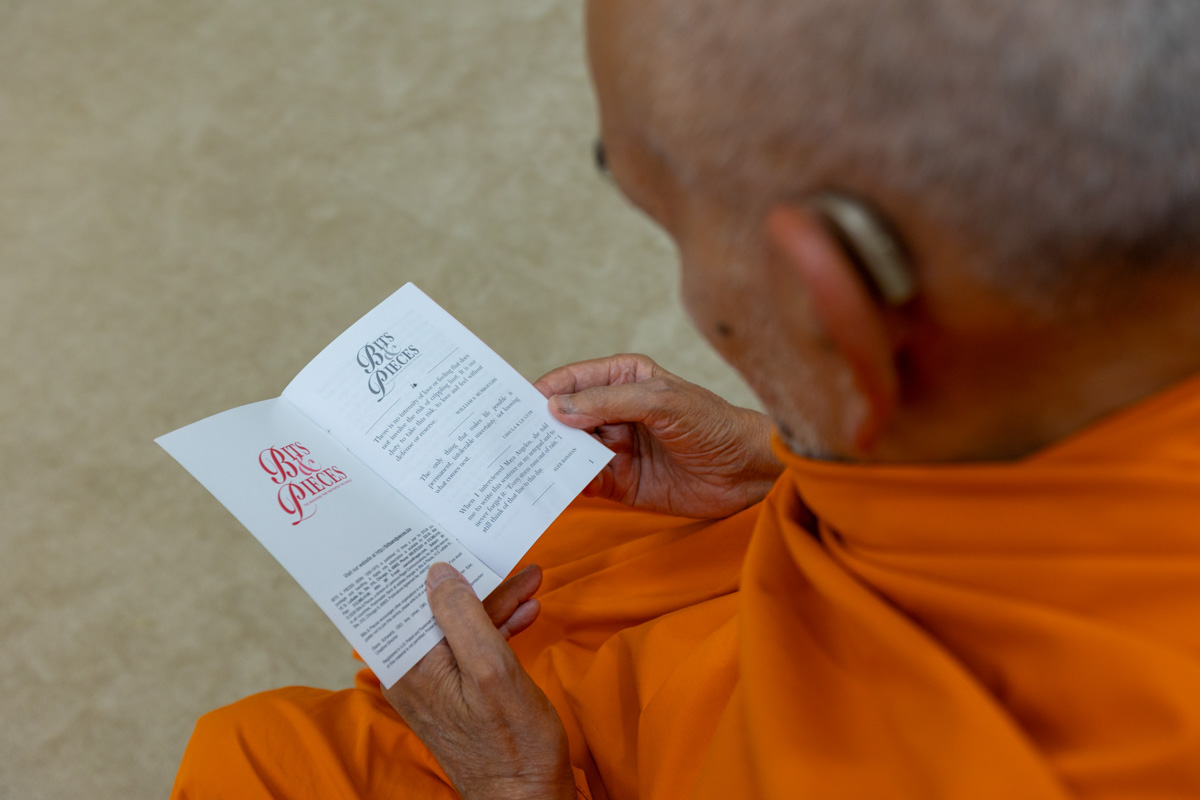 Swamishri reads a book