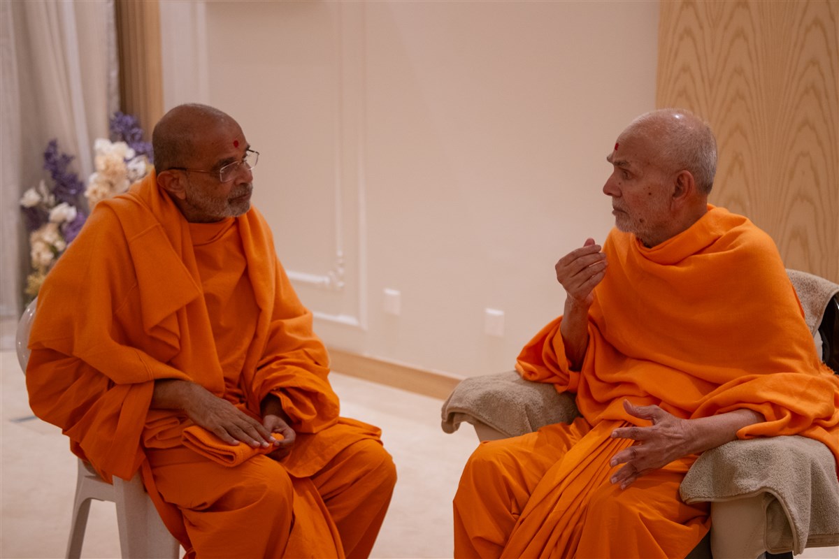 Swamishri in a meeting with a senior swami
