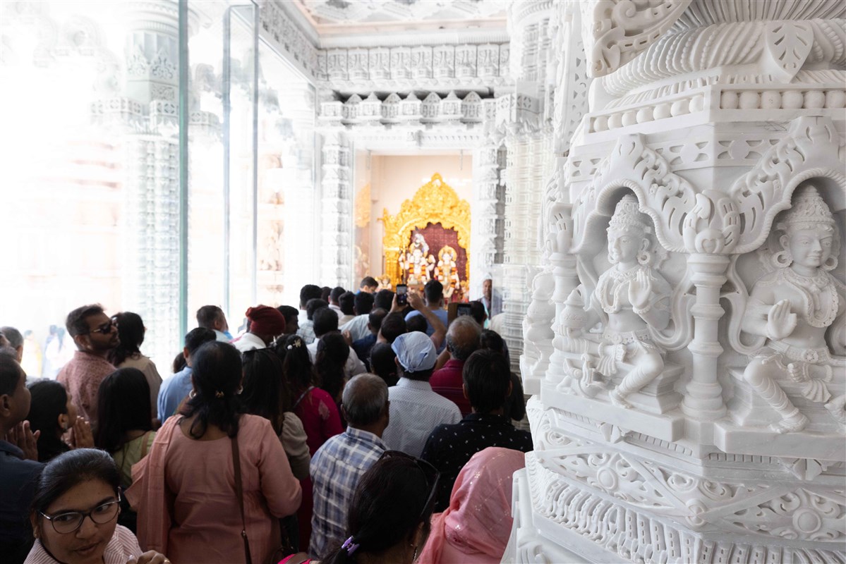 Pilgrims were engrossed in the darshan of the murtis of the Hindu deities 