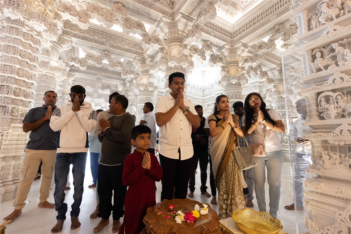 Pilgrims enjoyed darshan with their families of the deities in the various shrines