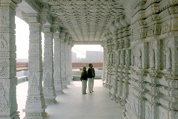  The beautiful mandir pradakshina with ornate pillars, ceilings and murtis of paramhansas and devotees