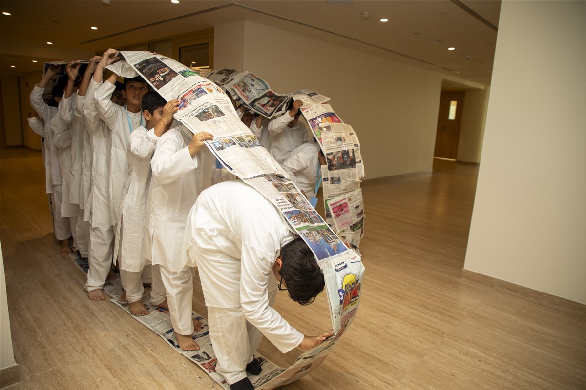 Children engage in a team building activity
