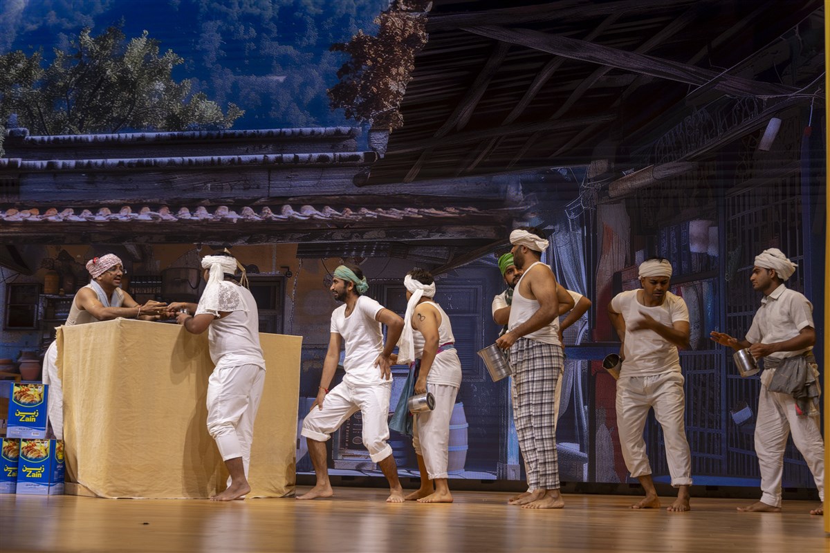 Volunteers perform a skit based on the significance of Prapti