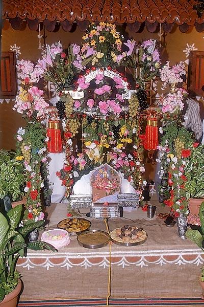 Shri Harikrishna Maharaj in a decorated cradle