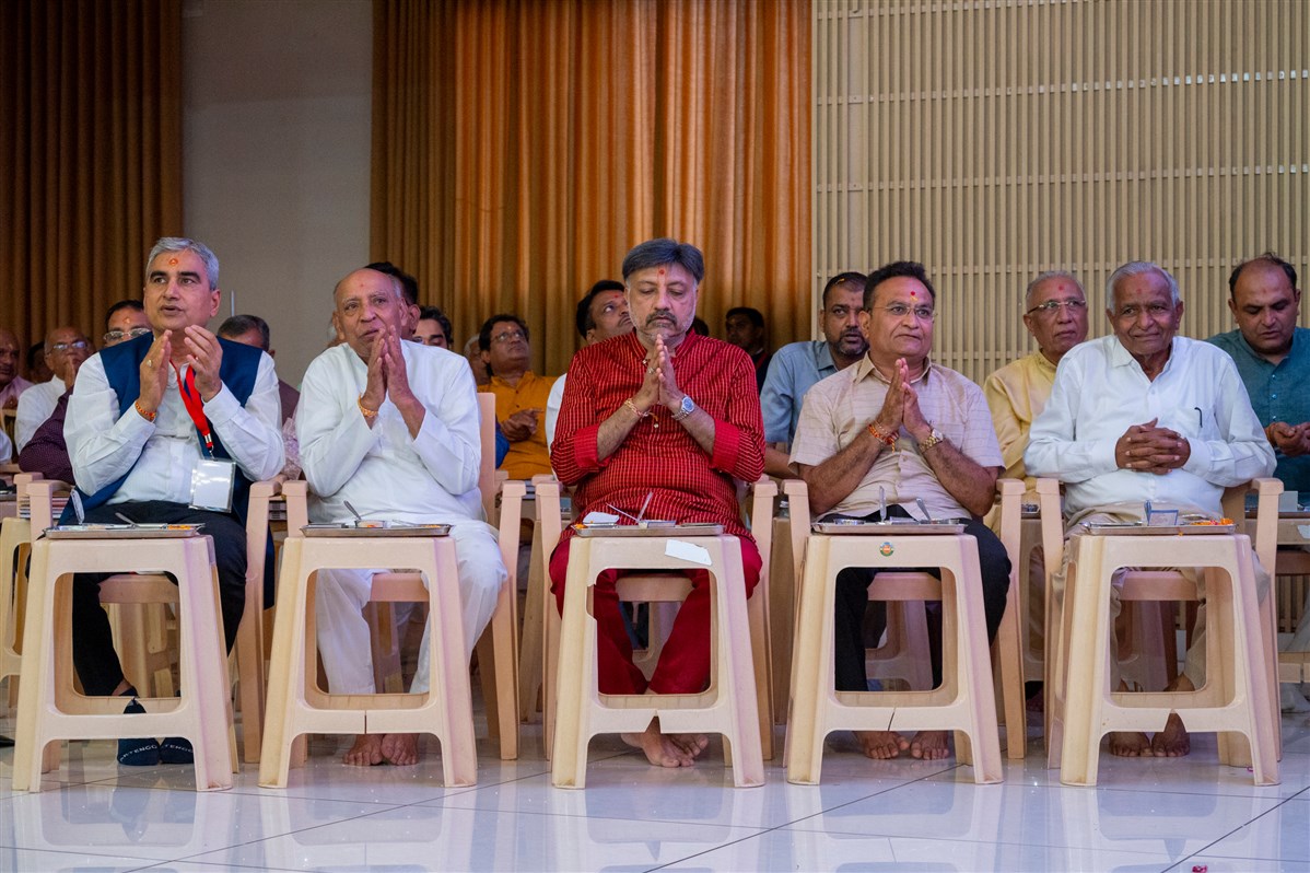 Devotees participate in mahapuja rituals