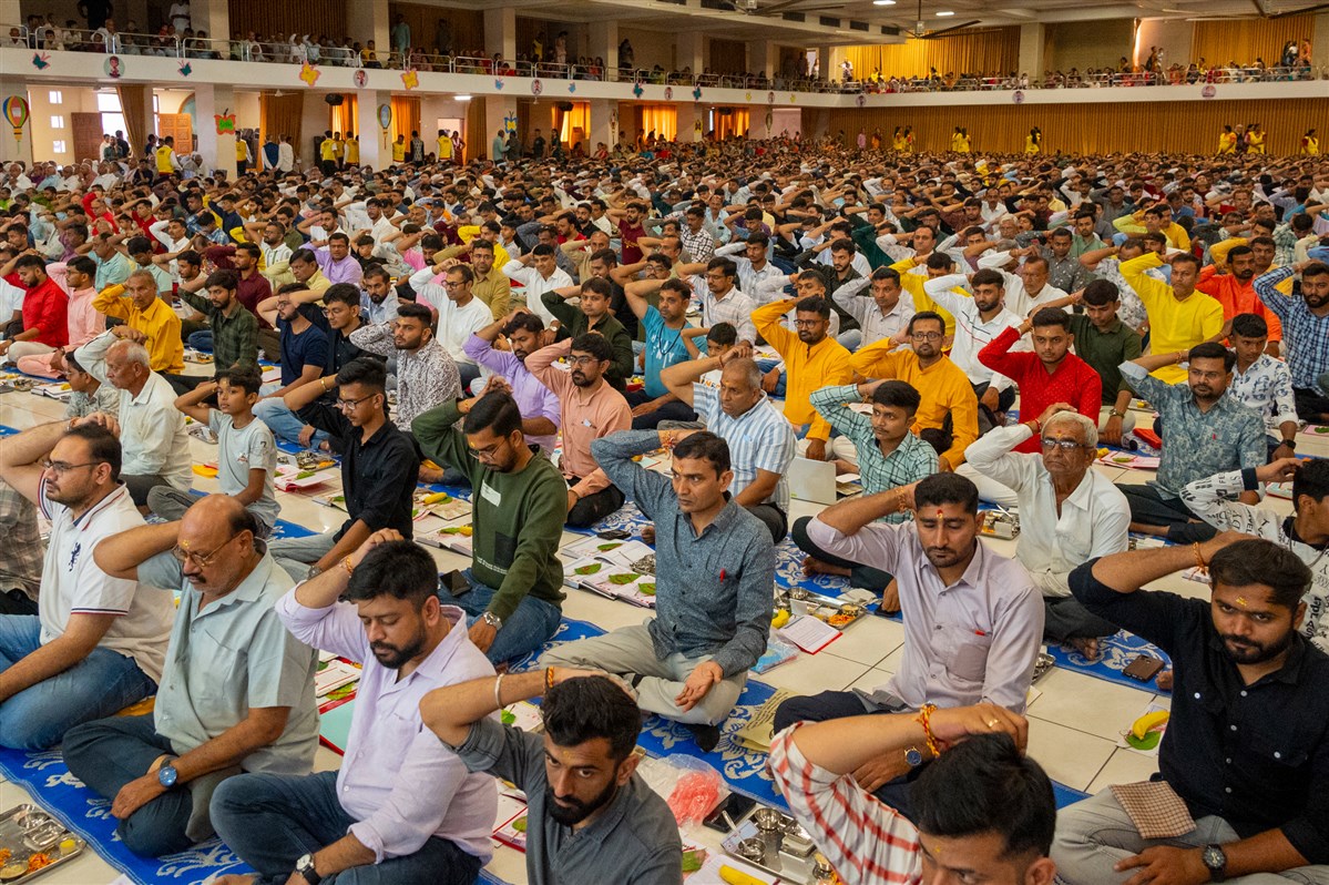 Devotees participate in mahapuja rituals