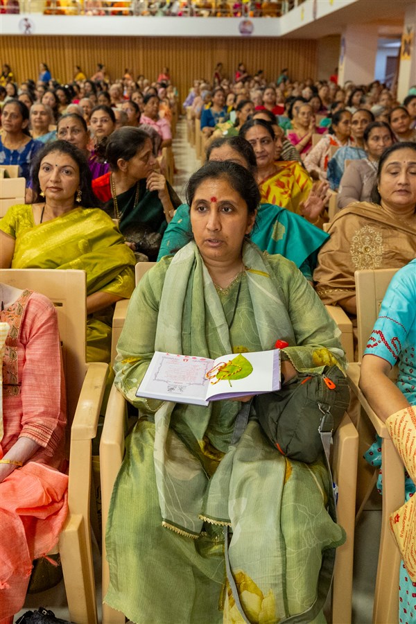 Devotees participate in mahapuja rituals