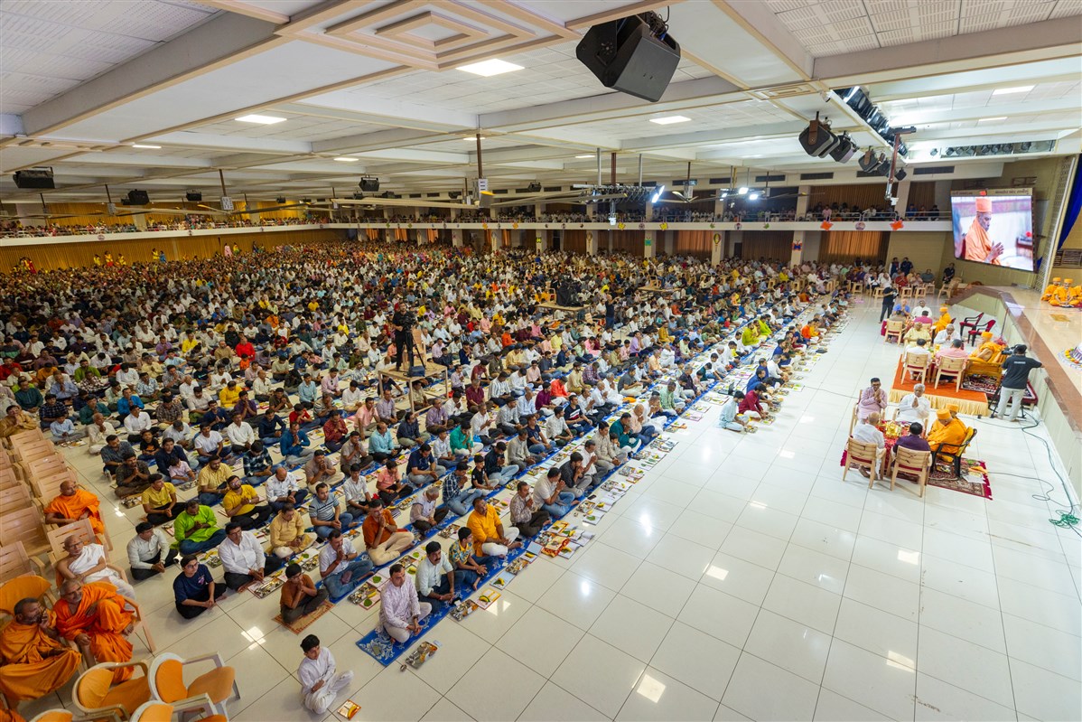 Devotees participate in mahapuja rituals