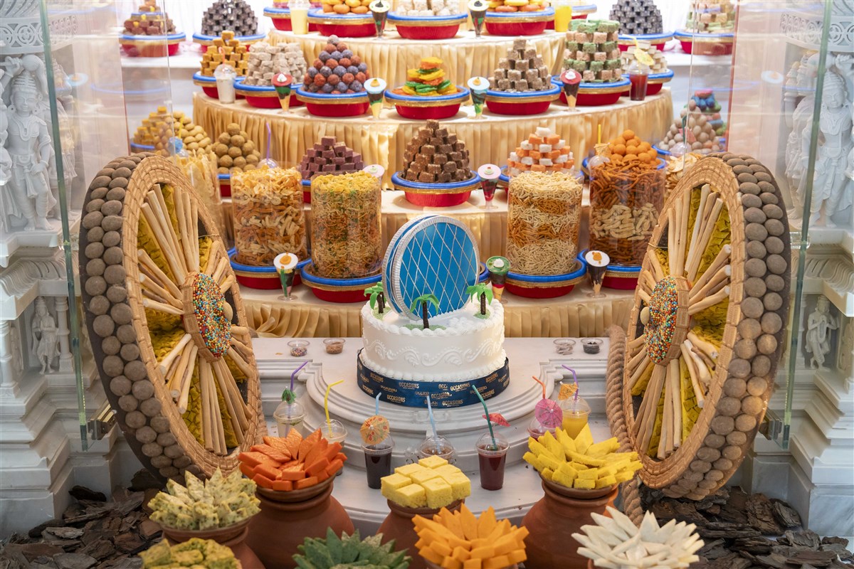  Sanctified food offered to the deities with cake marking the iconic Aldar Headquarters of Abu Dhabi