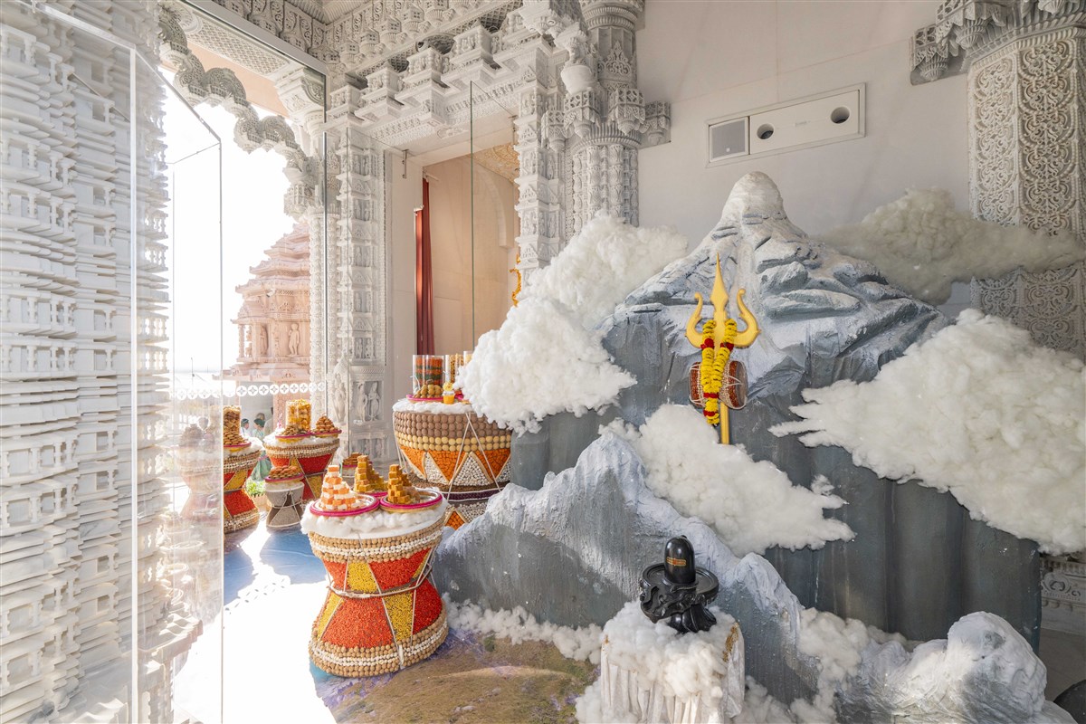 Annakut offered with the theme of Mt. Kailash and Lake Mansarovar at the shrine of Shiv Parivar