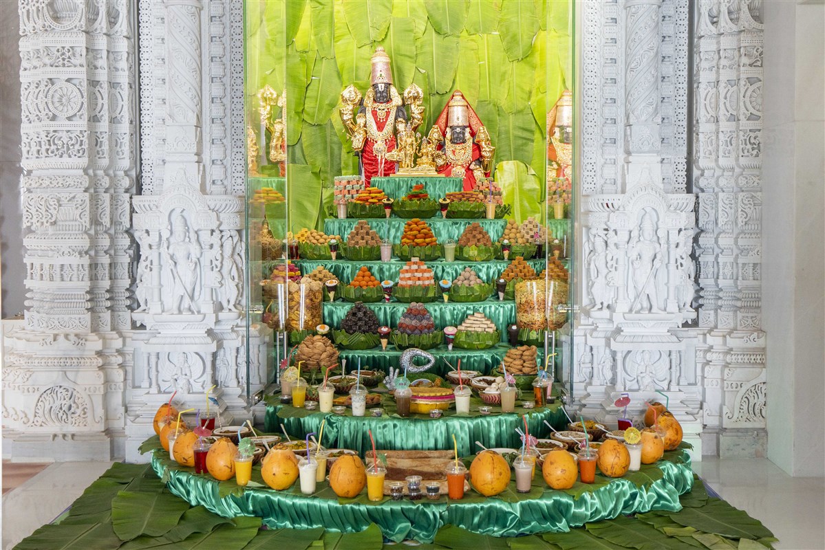 Annakut offered with South Indian traditions using banana leaves at the shrine of Bhagwan Shrinivas and Padmavatiji