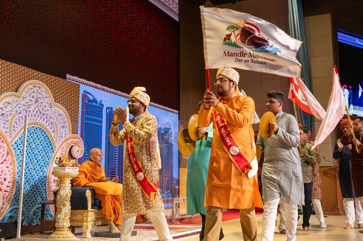 Youths perform a parade