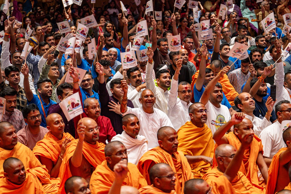 Devotees wave flags