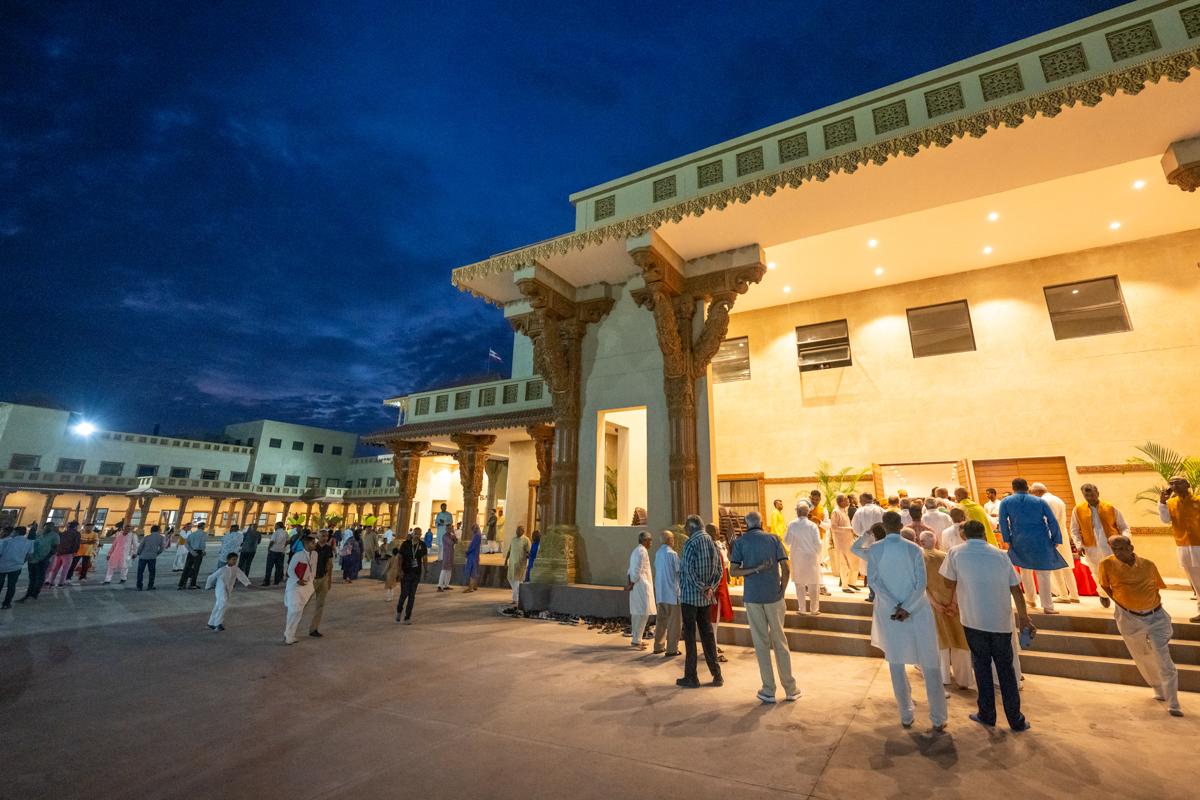 Devotees arrive for the murti-pratishtha rituals