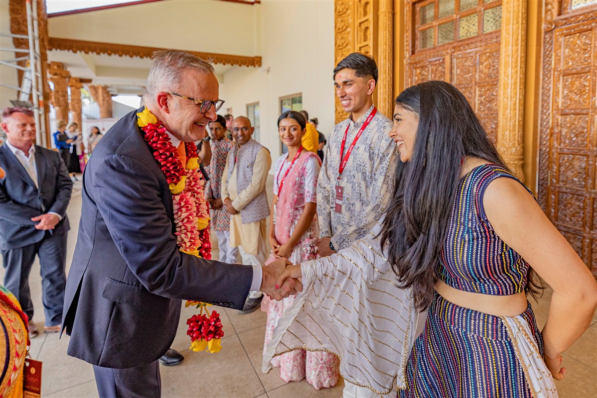 Prime Minister, Hon Anthony Albanese interacts with a young volunteer