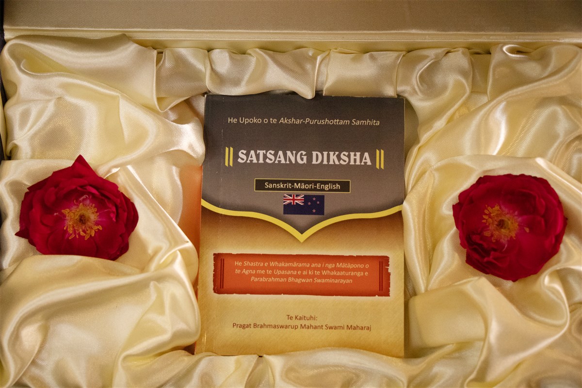 Inaugural print of Satsang Diksha in Sanskrit-Maori-English, blessed by Mahant  Swami Maharaj  