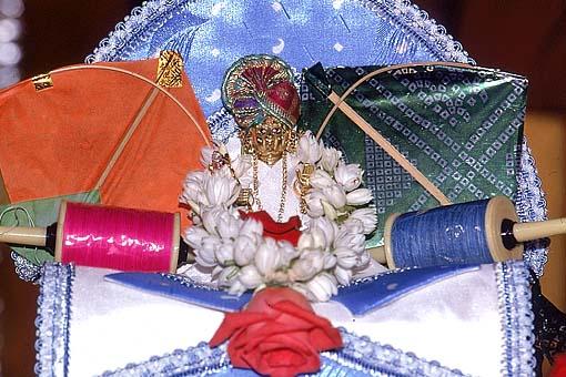 Lord Harikrishna Maharaj on the festival day of Joli and kite flying 
