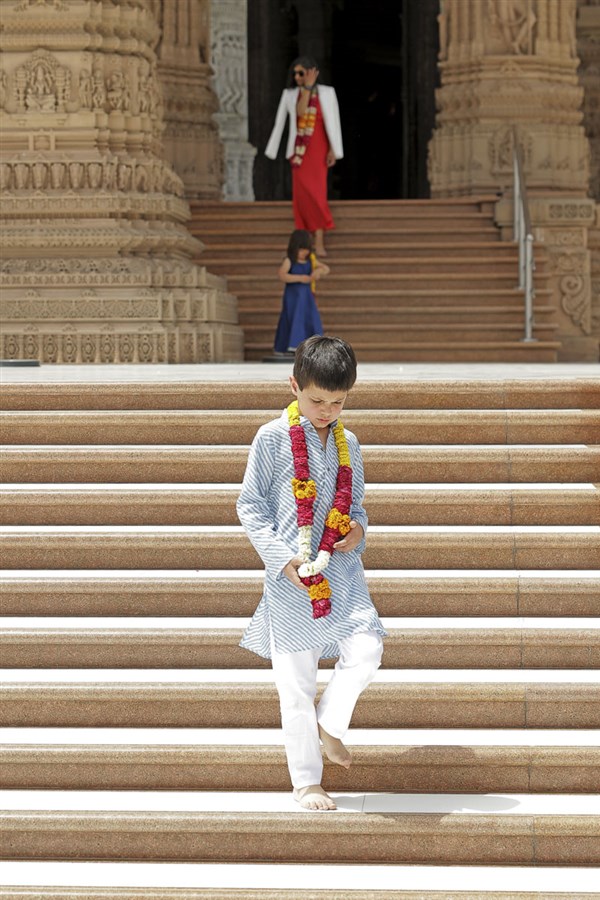 Ewan, son of US Vice President JD Vance, descends the mandir steps