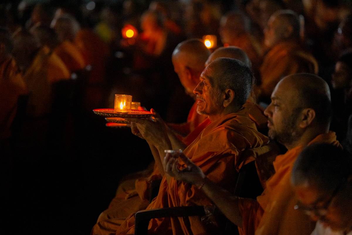 Swamis perform the arti