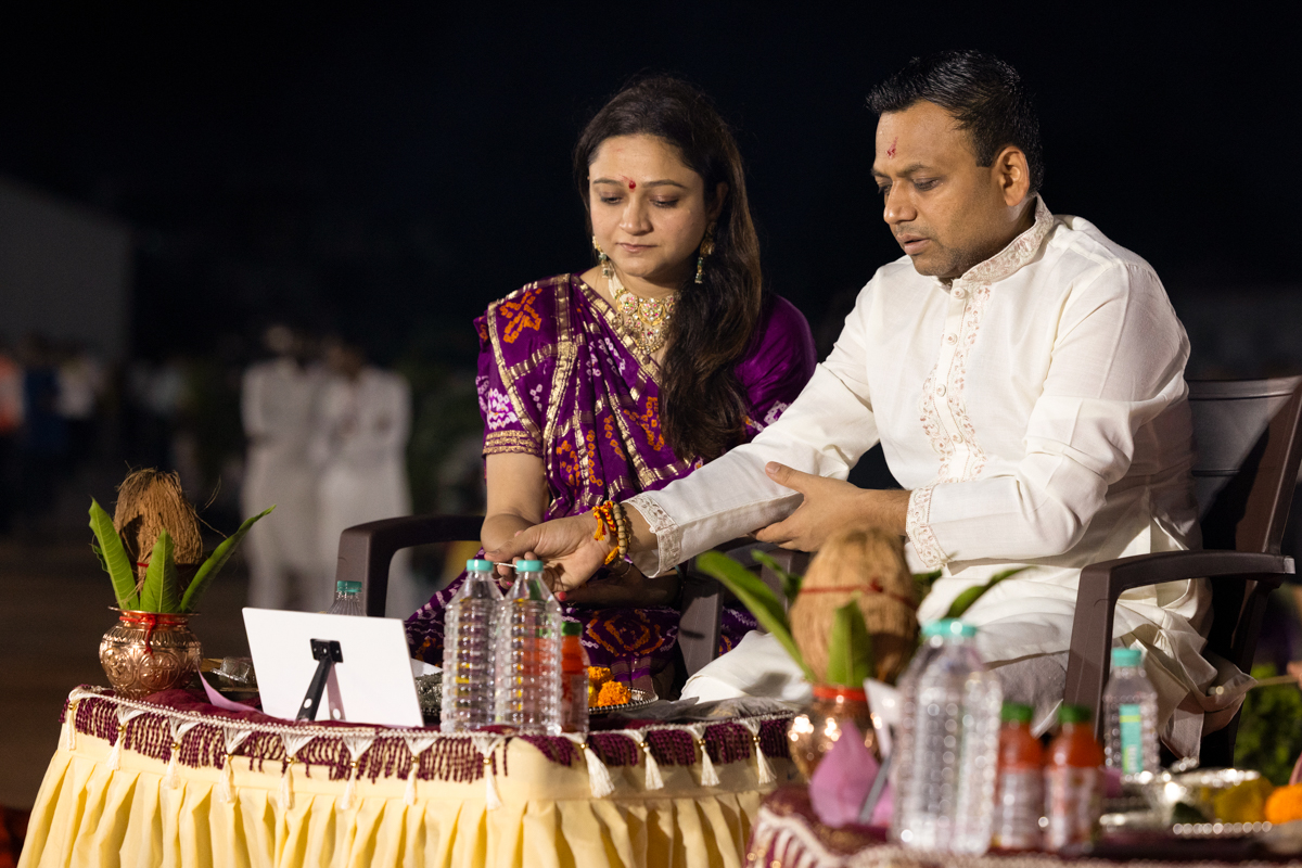 Devotees participate in the yagna rituals