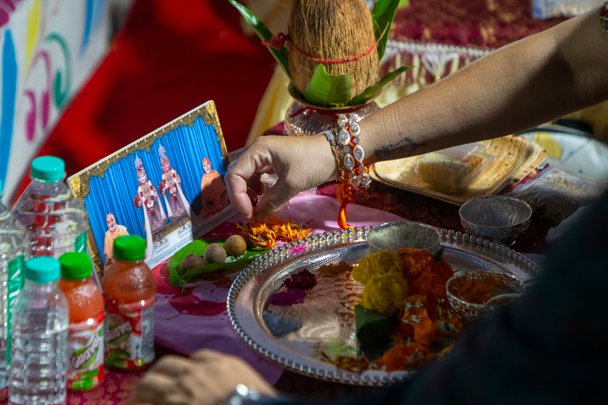 Devotees participate in the yagna rituals