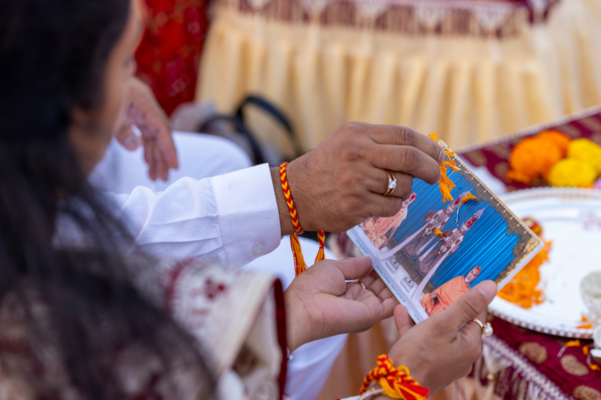 Devotees participate in the yagna rituals