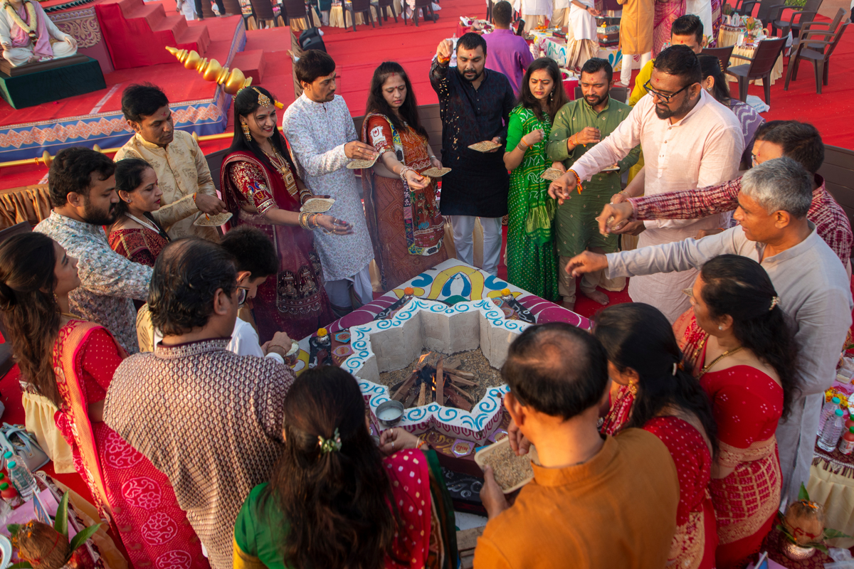 Devotees participate in the yagna rituals