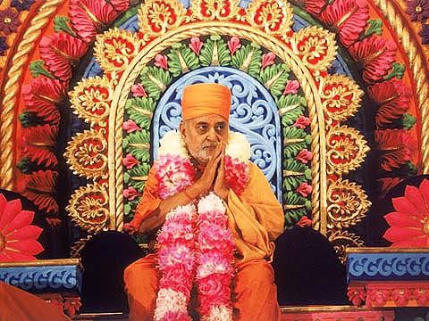 Swamishri, after being honored with a garland 