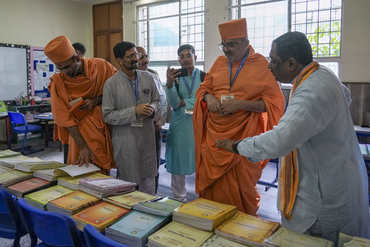 Bhadresh Swami, along with renowned Sanskrit scholars, visiting Sanskrit publication stalls