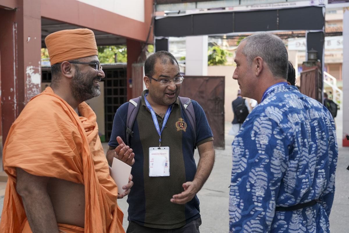 Dr. Aksharanand Swami in discussion with renowned Sanskrit scholars from across the globe