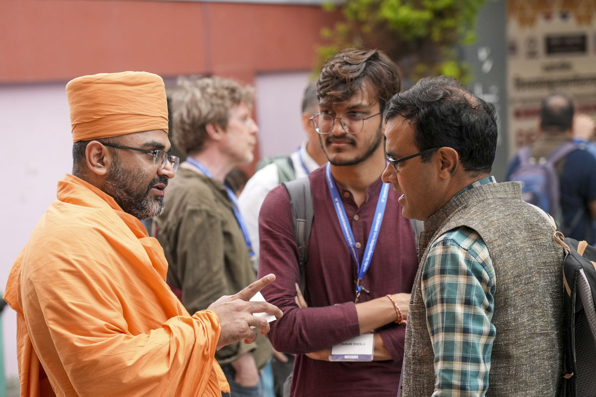 Dr. Aksharanand Swami in discussion with renowned Sanskrit scholars from across the globe