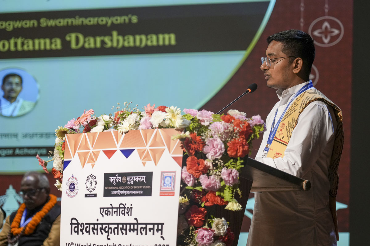 Dr. Sagar Acharya, Principal of BAPS Swaminarayan Sanskrit College, Sarangpur, presented a research paper during the special panel on Akshar Purushottam Darshan