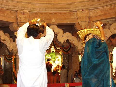 Devotees performing Maha-Abhishek by pouring holy water brought from 108 rivers 