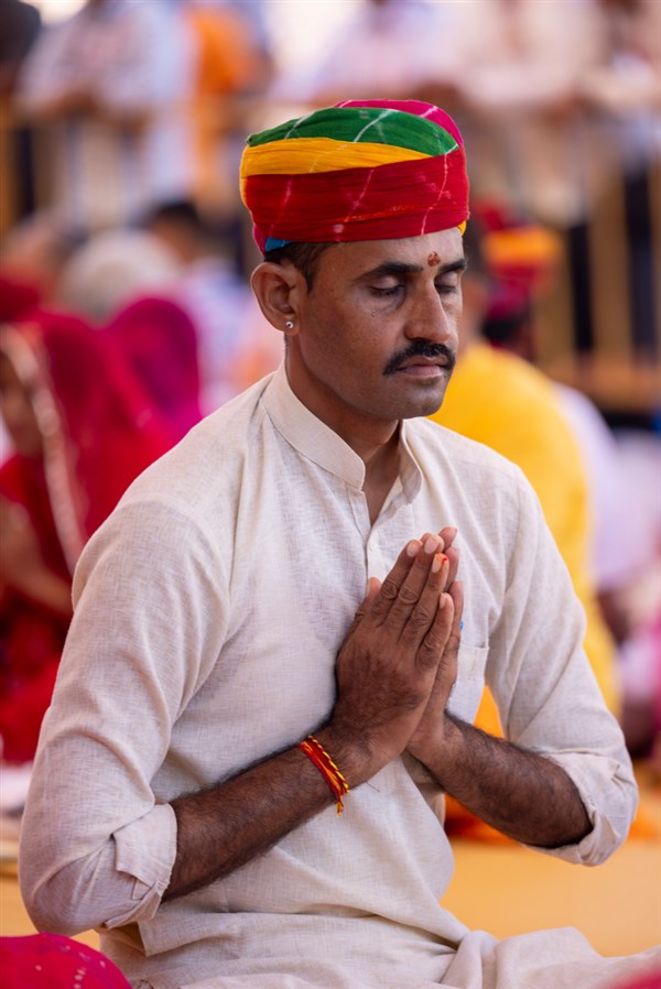 Devotees and well-wishers participate in the yagna rituals