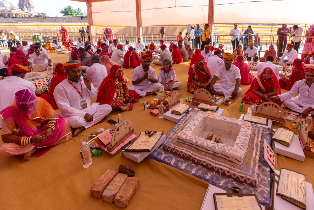 Devotees and well-wishers participate in the yagna rituals