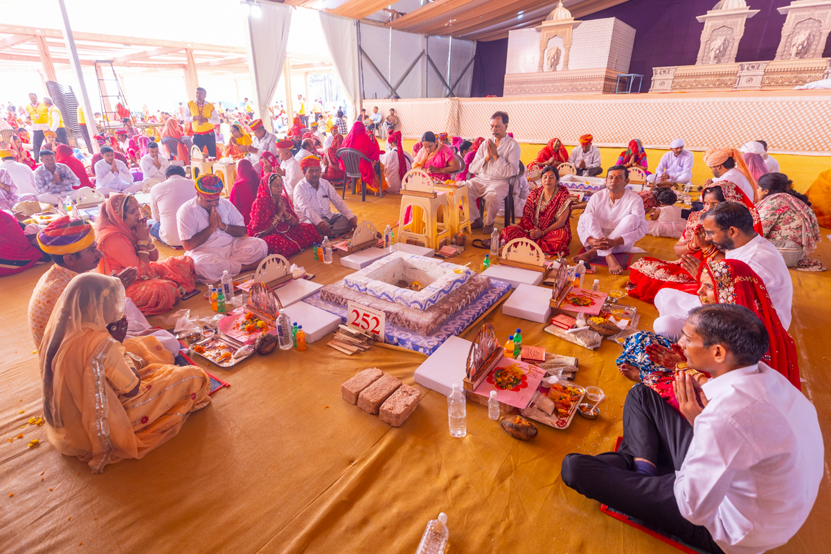 Devotees and well-wishers participate in the yagna rituals