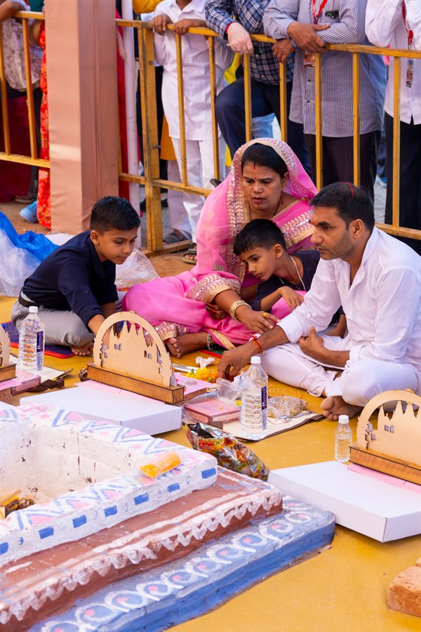 Devotees and well-wishers participate in the yagna rituals