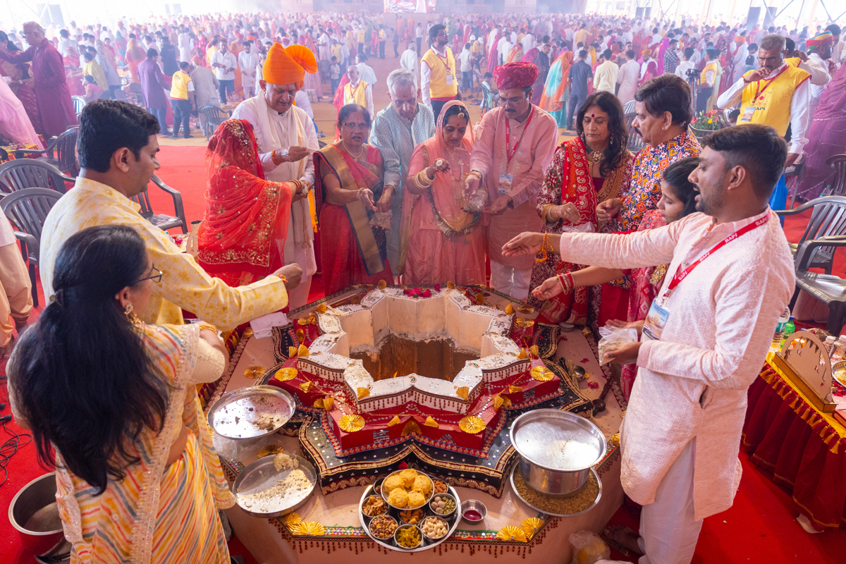 Devotees and well-wishers participate in the yagna rituals