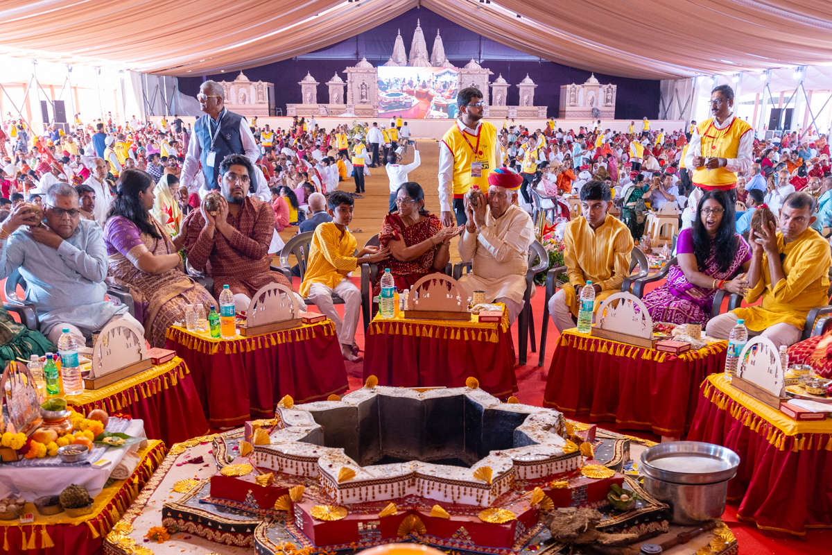 Devotees and well-wishers participate in the yagna rituals