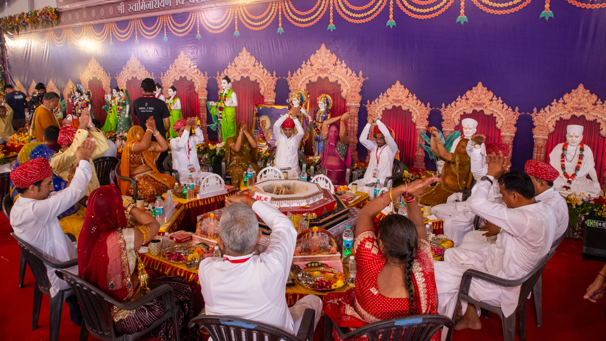 Devotees and well-wishers participate in the yagna rituals