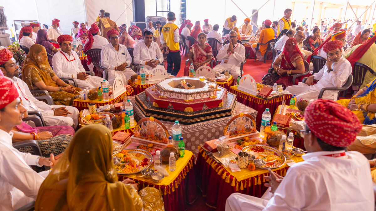 Devotees and well-wishers participate in the yagna rituals