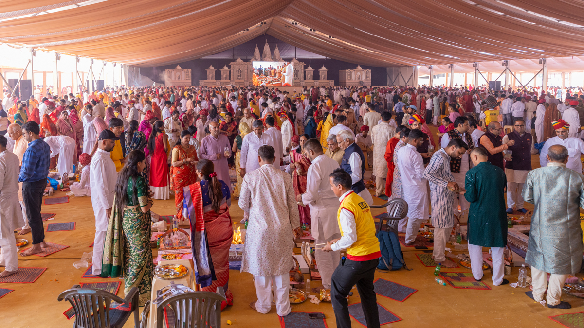 Devotees and well-wishers participate in the yagna rituals
