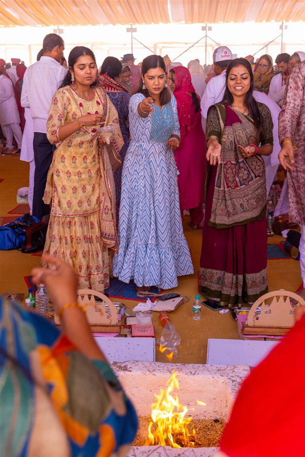 Devotees and well-wishers participate in the yagna rituals