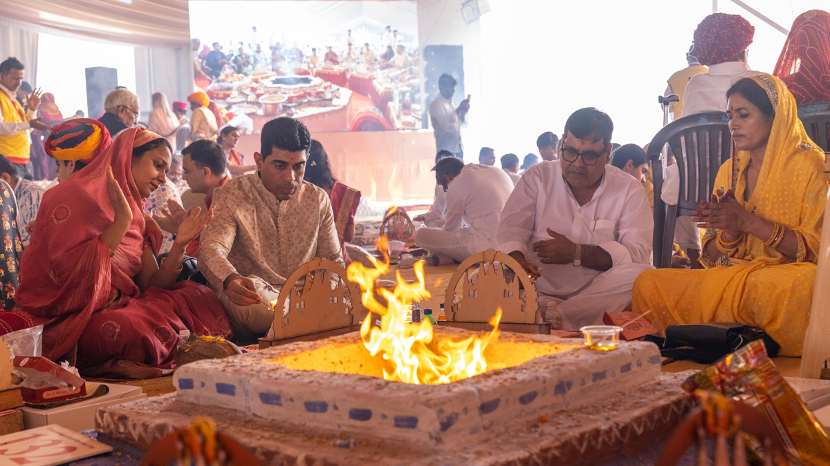 Devotees and well-wishers participate in the yagna rituals