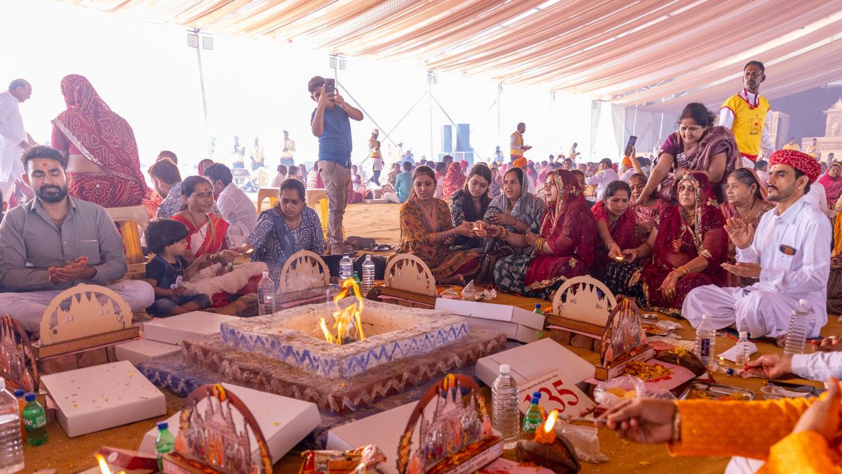Devotees and well-wishers participate in the yagna rituals