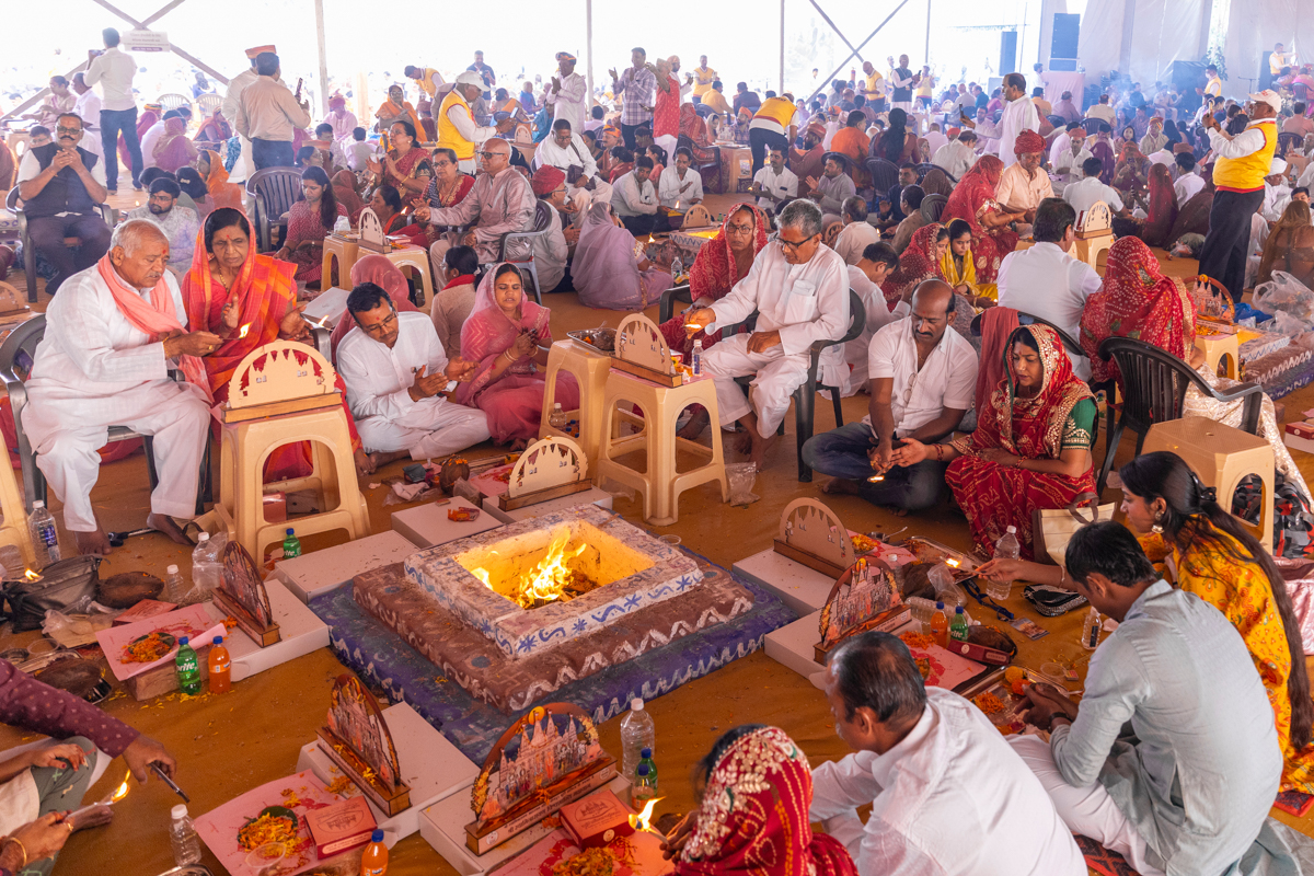 Devotees and well-wishers participate in the yagna rituals