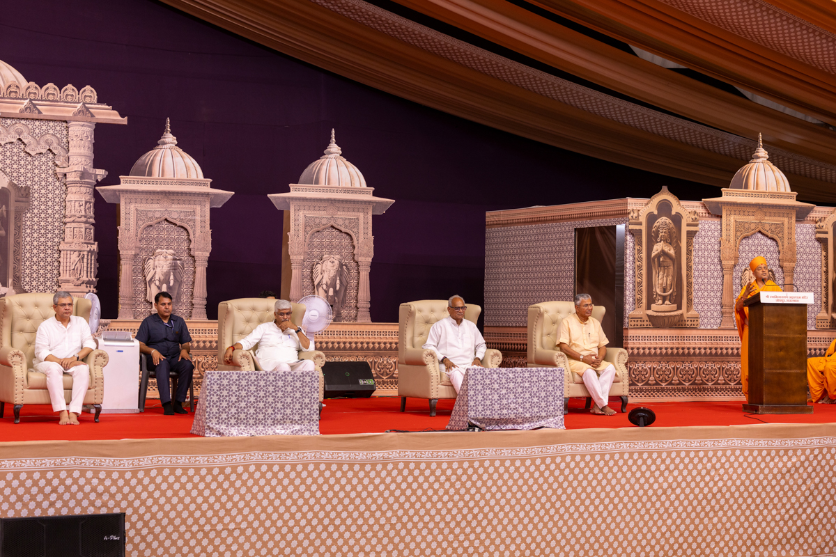 Dignitaries on the stage during the assembly